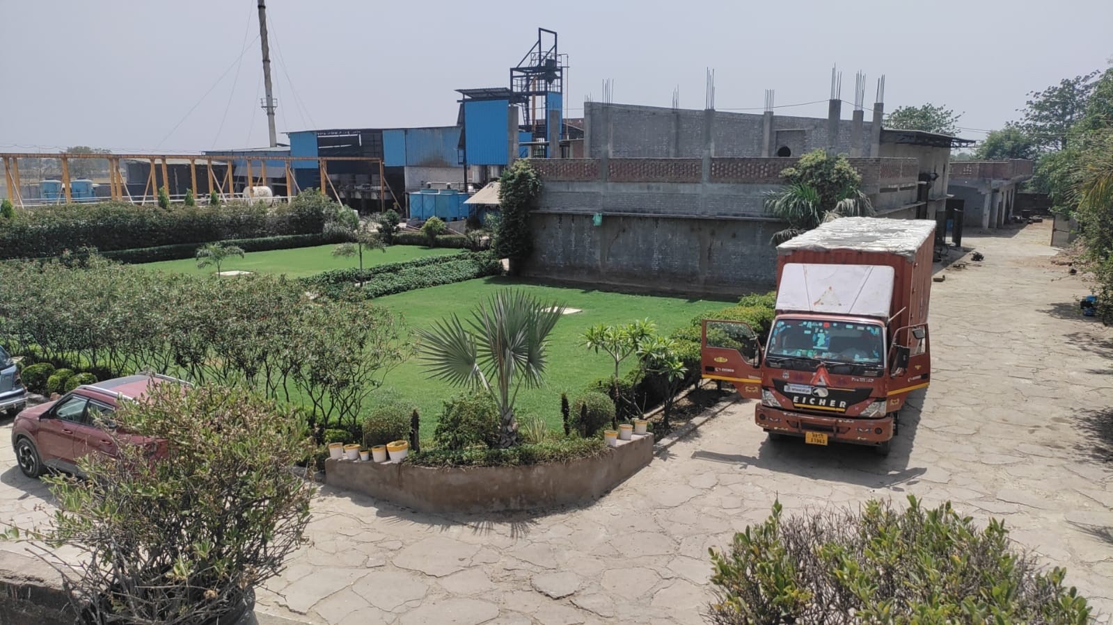 NTG Manufacturing Plant interior — drum dryers in operation